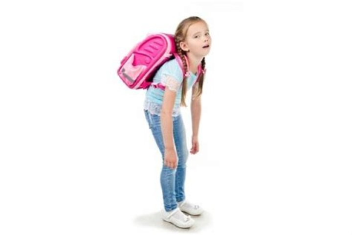 Can a heavy backpack cause scoliosis?