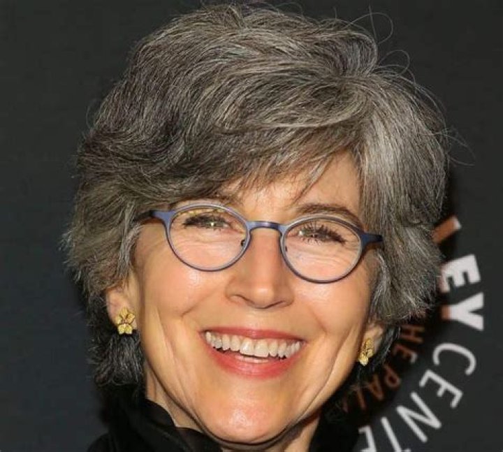 Who Is Daena E. Title?